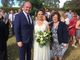 Sylvie with a bride and groom.