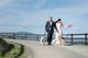 The bride and groom walk their dogs on the way to the ceremony.