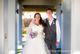 The bride and groom posing before the wedding ceremony.